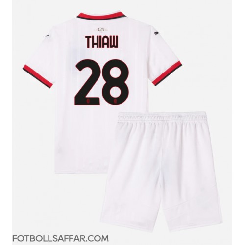 AC Milan Malick Thiaw #28 Bortadräkt Barn 2024-25 Kortärmad (+ Korta byxor)